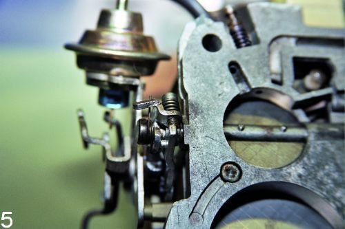 On most carburetors, the fast-idle speed screw is in an awkward position, but must be adjusted for the proper performance. On later Q-Jets, if the choke spring has any tension, the secondary barrels will not open because of a lock lever that contacts the fast-idle cam.
